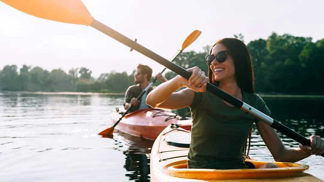 Couple Kayaking on a lake.
