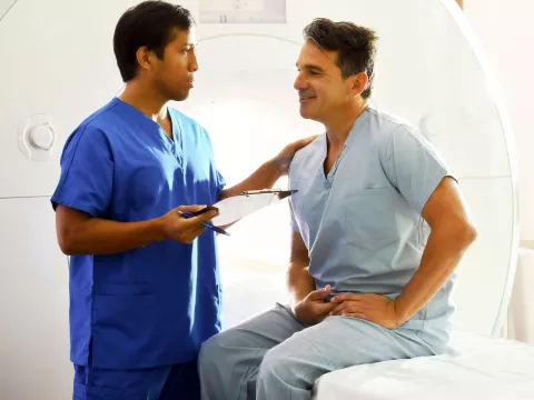 A man prepares for his MRI.